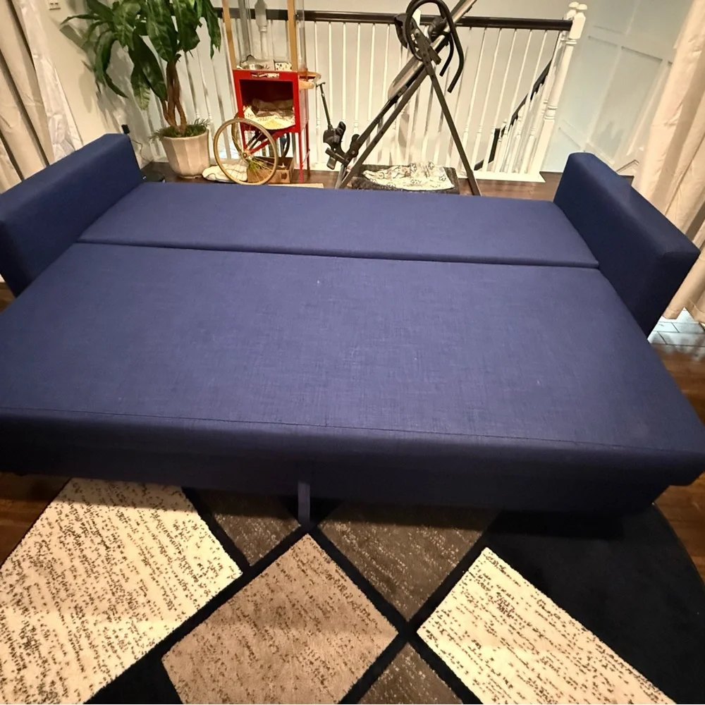 Elegant Blue Sofa sleeper with storage. Pick up only in WPB